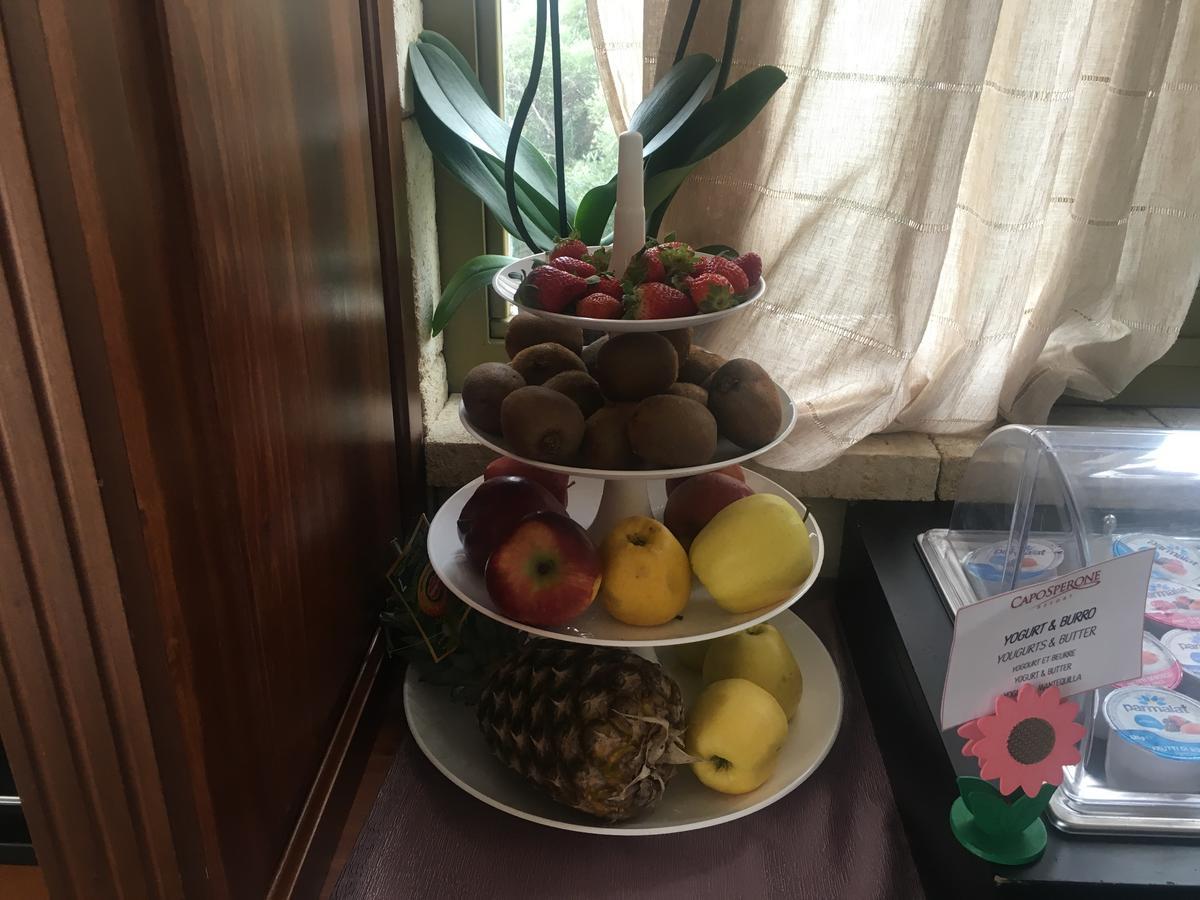 Caposperone Resort Палми Екстериор снимка