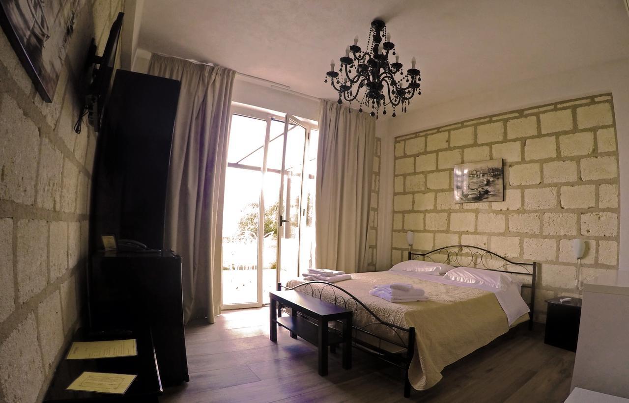 Caposperone Resort Палми Екстериор снимка