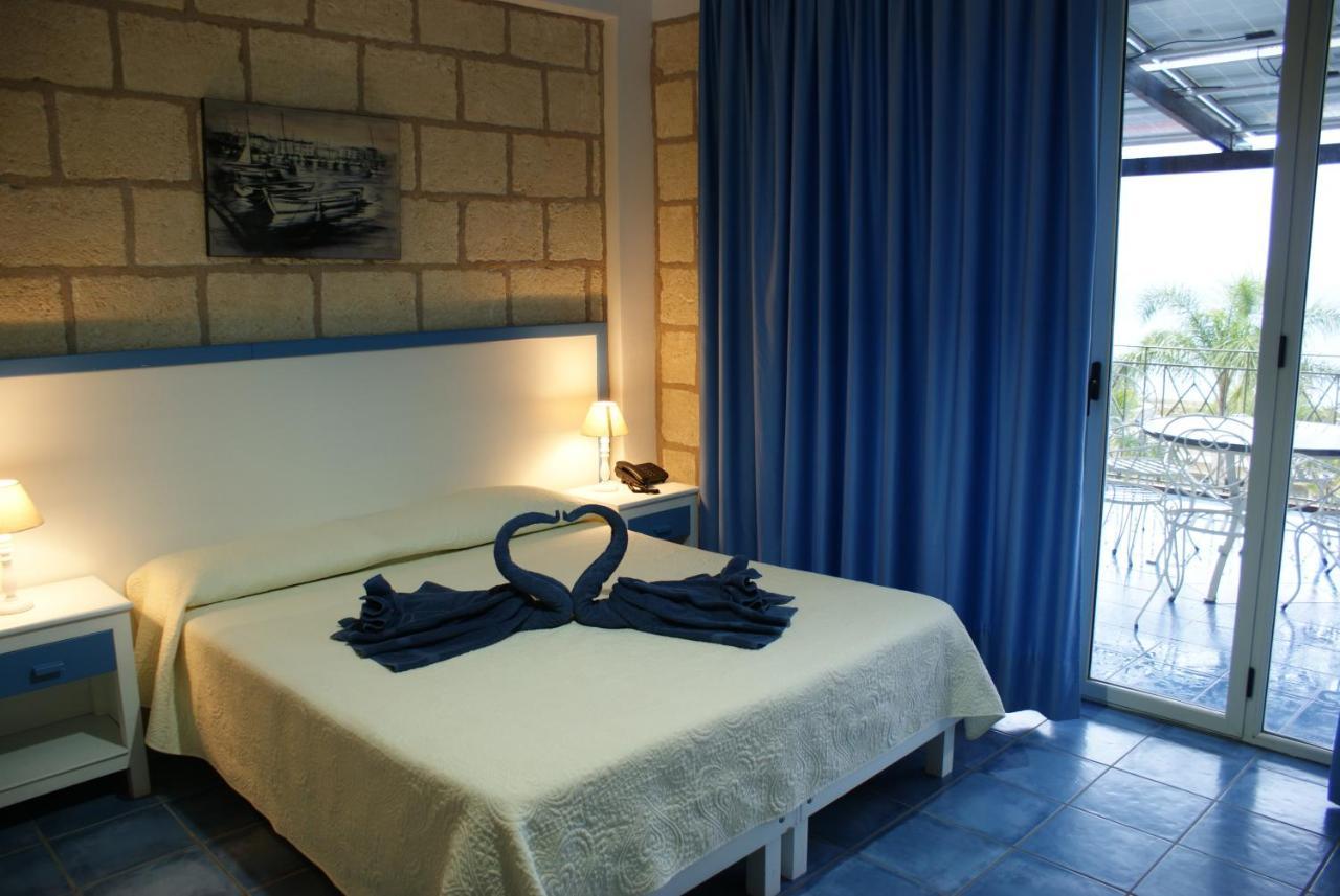 Caposperone Resort Палми Екстериор снимка