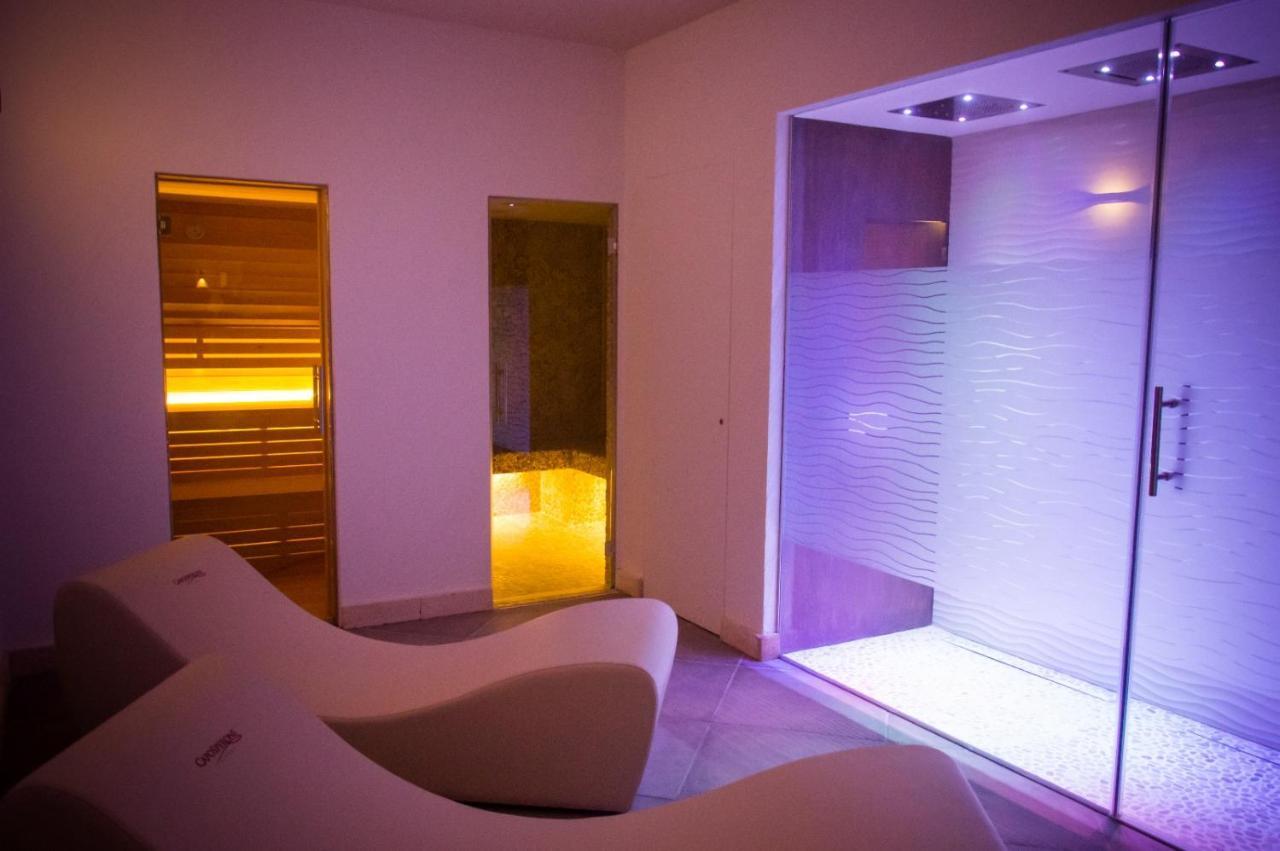 Caposperone Resort Палми Екстериор снимка