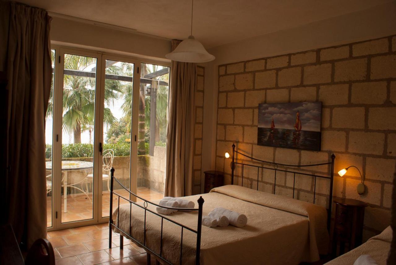 Caposperone Resort Палми Екстериор снимка